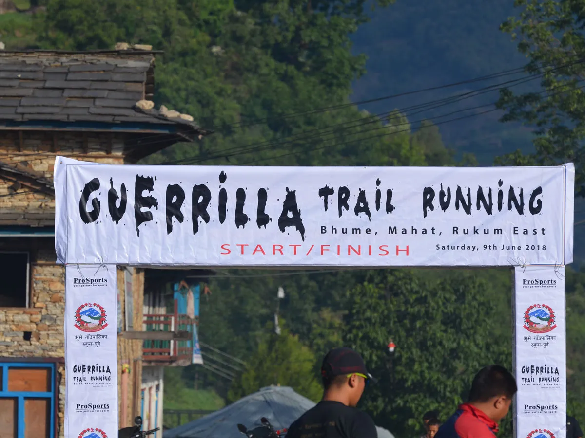 Start and finish archway banner for the Guerrilla Trail Running event in Bhume, Mahat, Rukum East Nepal