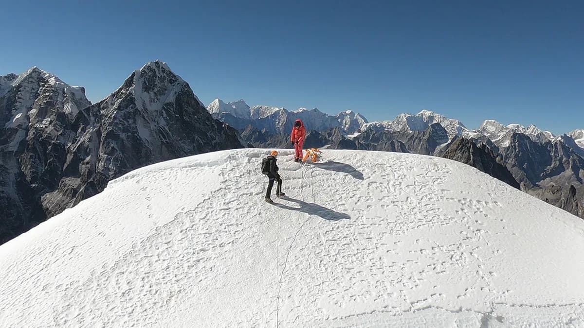 climber on top to lobuche peak and clear sky with beautiful himalayas