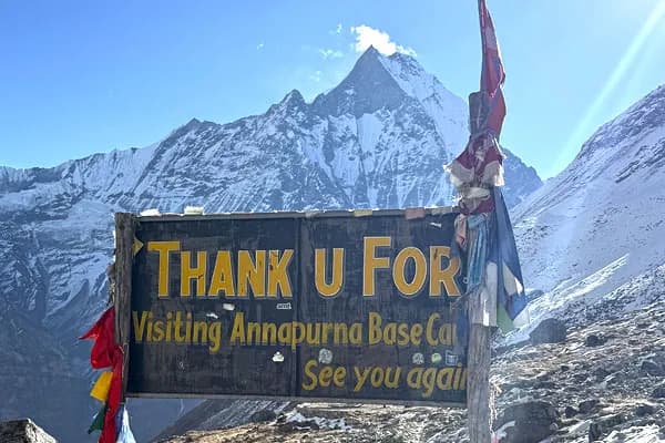Reaching the iconic Annapurna Base Camp sign board marks the culmination of the popular ABC trekking route.