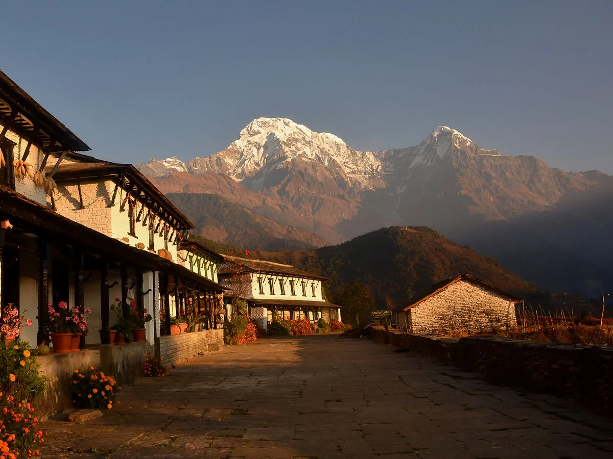 Traditional stone-roofed houses in Ghandruk village below Annapurna South mountain.