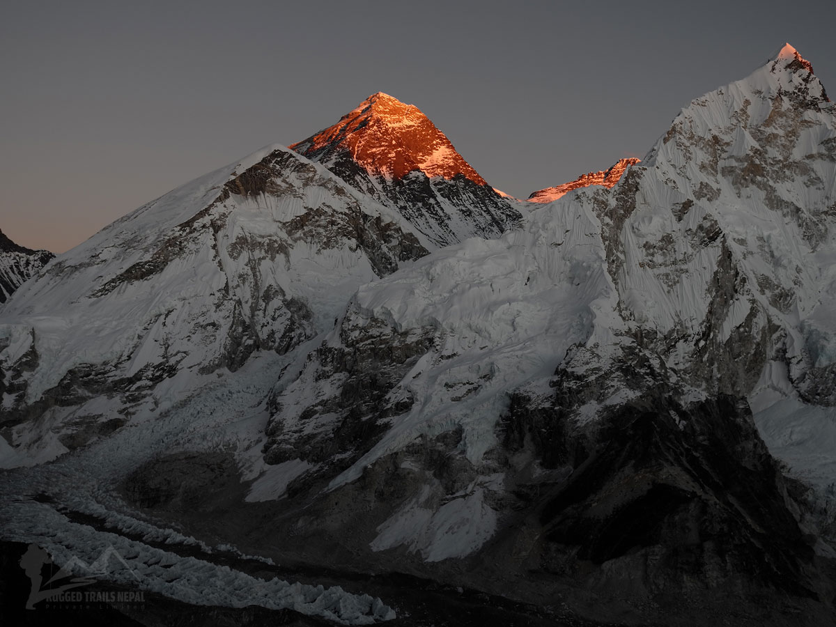 Mount Everest summit glowing during golden hour sunset from Kala Patthar viewpoint