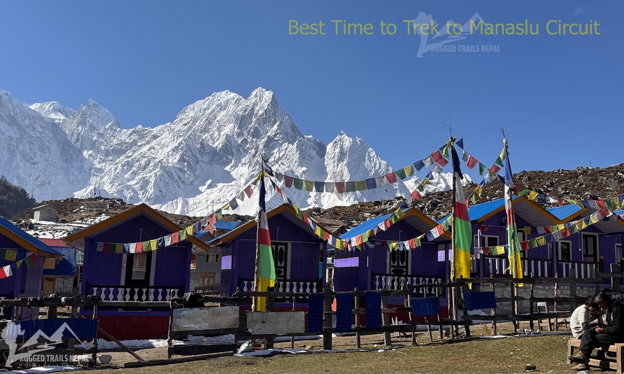 beautiful weather, snowy mountain, local tea houses with the prayers flag in manaslu trek