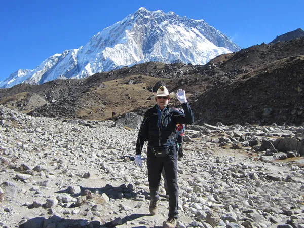 a trekker walking under the clear sky with the great mountain view on tashi labsta trek