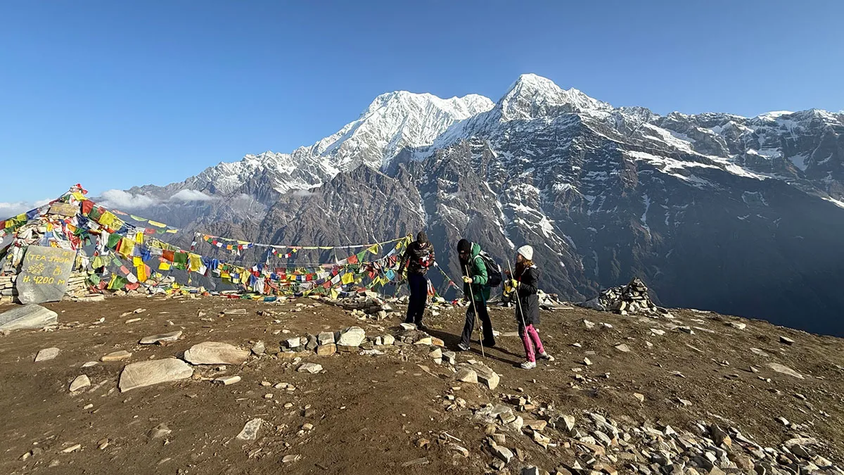 trekkers at mardi himal viewpoint, view of stunning annapurna himalayas
