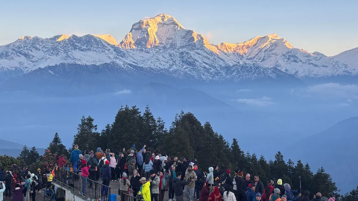 morning view from poon hill ghorepani of mt dhaulagiri and trekkers
